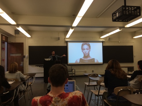 Kevin Allred plays "Ghost" for the students in "Politicizing Beyonce"